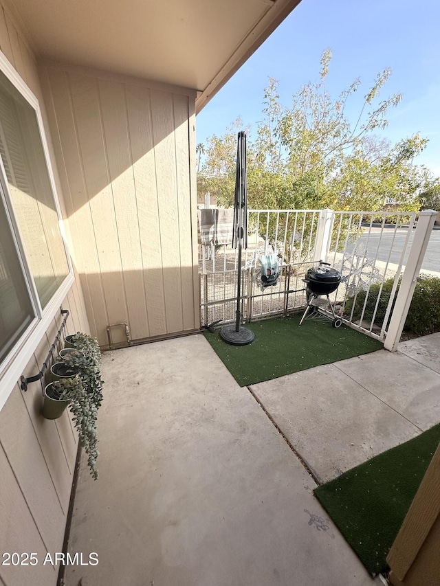 view of patio / terrace with a balcony