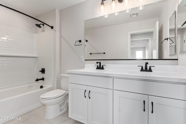 full bathroom featuring tile patterned flooring, vanity, bathtub / shower combination, and toilet