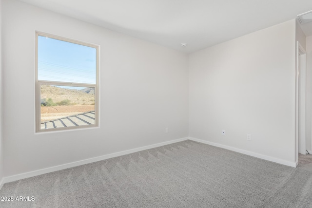 view of carpeted spare room