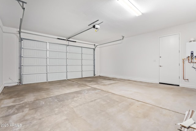 garage with tankless water heater and a garage door opener