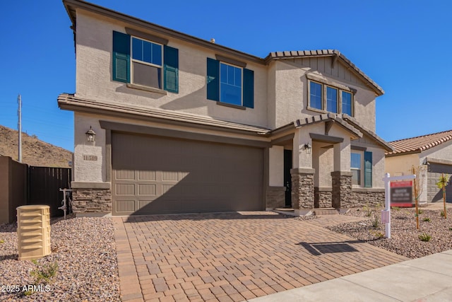 view of front of property with a garage