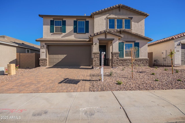 view of front of home with a garage