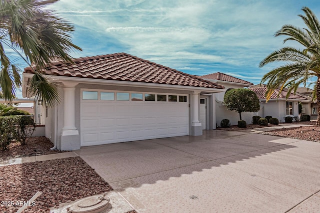 mediterranean / spanish-style house featuring a garage