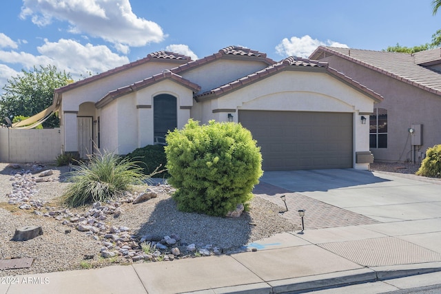 view of front of home with a garage