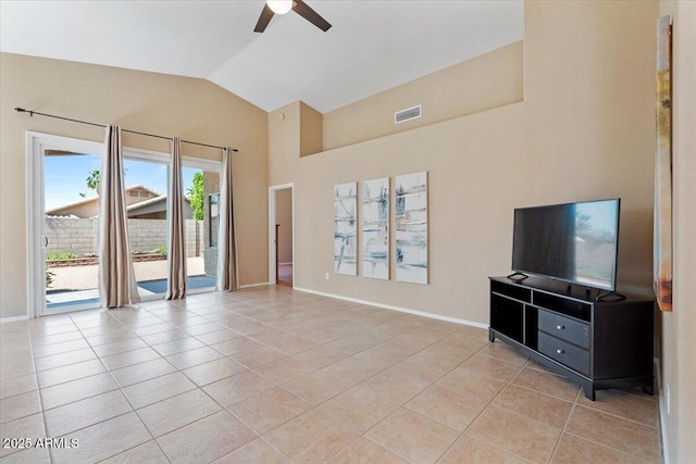 4459 E Desert Wind Dr, Phoenix, AZ 85044 - unfurnished living room with a ceiling fan, lofted ceiling, and light tile patterned flooring