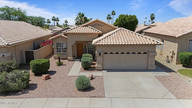 4459 E Desert Wind Dr, Phoenix, AZ 85044 - mediterranean / spanish house with a tiled roof, an attached garage, stucco siding, and concrete driveway