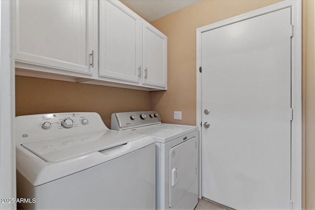 4459 E Desert Wind Dr, Phoenix, AZ 85044 - laundry room featuring independent washer and dryer and cabinet space