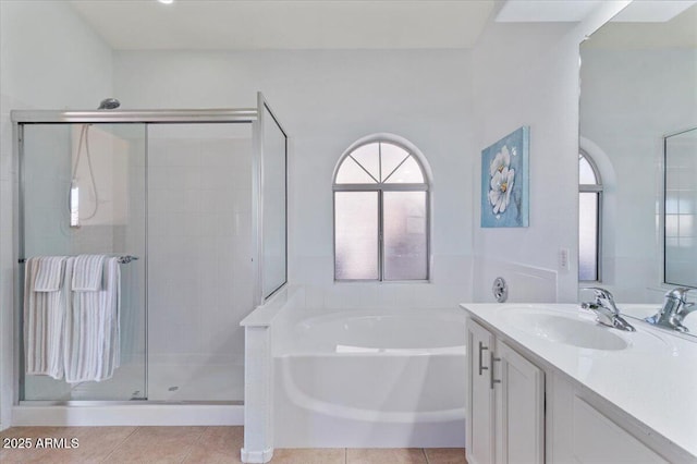 4459 E Desert Wind Dr, Phoenix, AZ 85044 - bathroom featuring a bath, vanity, a shower stall, and tile patterned flooring