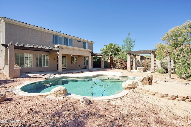 view of swimming pool featuring a pergola and a patio area