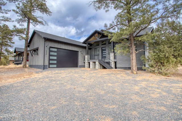 view of front facade with driveway and an attached garage