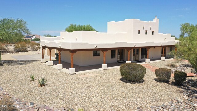 back of house featuring a patio area