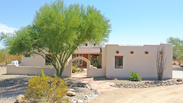 view of adobe home