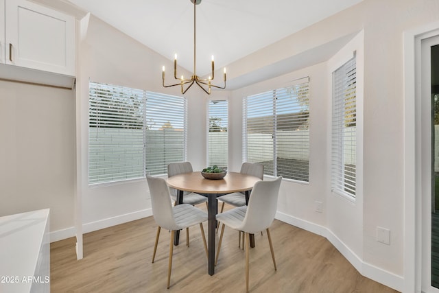 7685 W San Miguel Ave, Glendale, AZ 85303 - dining room featuring light wood finished floors and a chandelier
