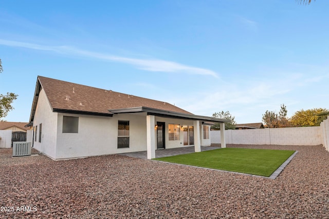 7685 W San Miguel Ave, Glendale, AZ 85303 - rear view of house featuring a fenced backyard, stucco siding, roof with shingles, and a patio area