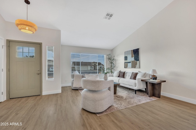 7685 W San Miguel Ave, Glendale, AZ 85303 - living area with wood finished floors and lofted ceiling