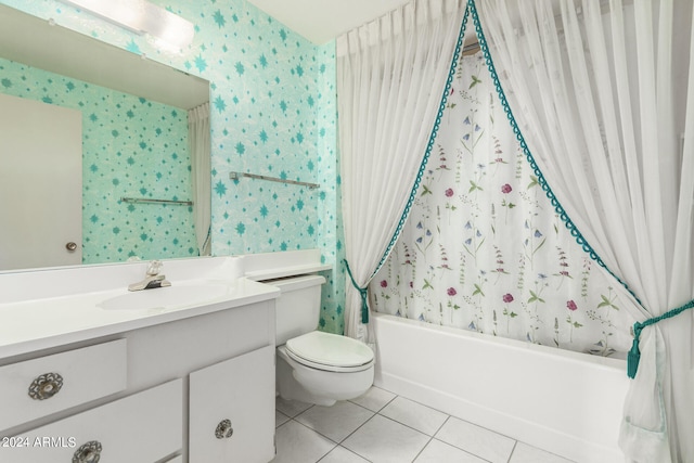 full bathroom with tile patterned flooring, toilet, shower / tub combo with curtain, and vanity