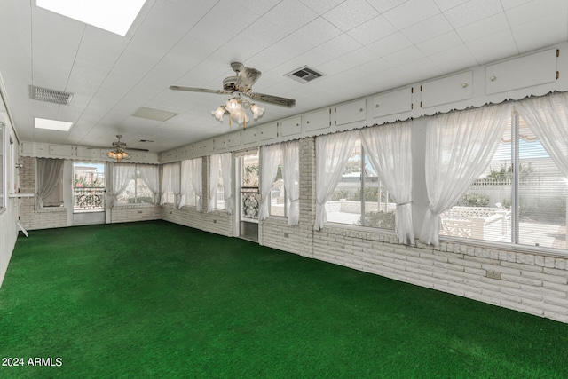 interior space featuring ceiling fan