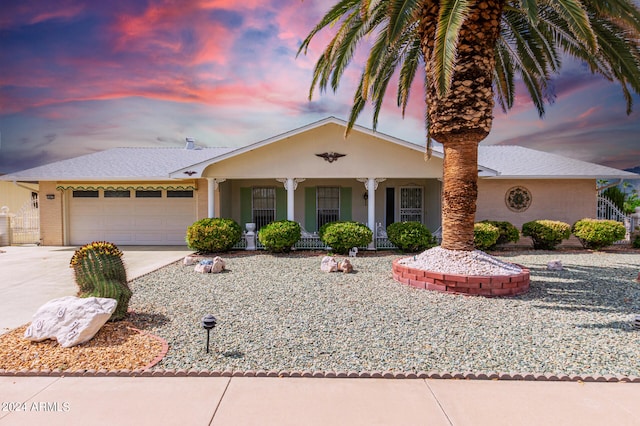 view of front of property featuring a garage