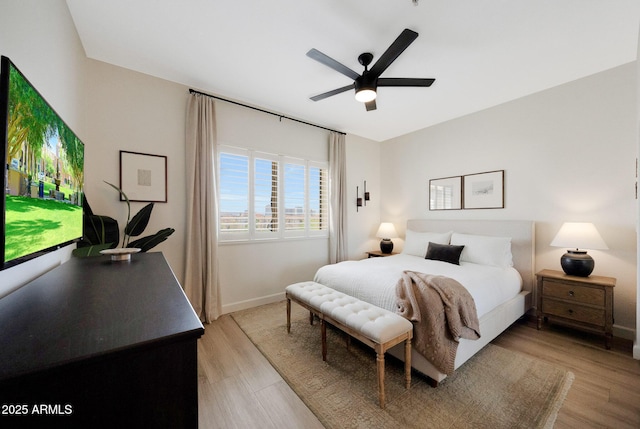 920 E Devonshire Ave Unit 4004, Phoenix, AZ 85014 - bedroom with light wood-style flooring and a ceiling fan