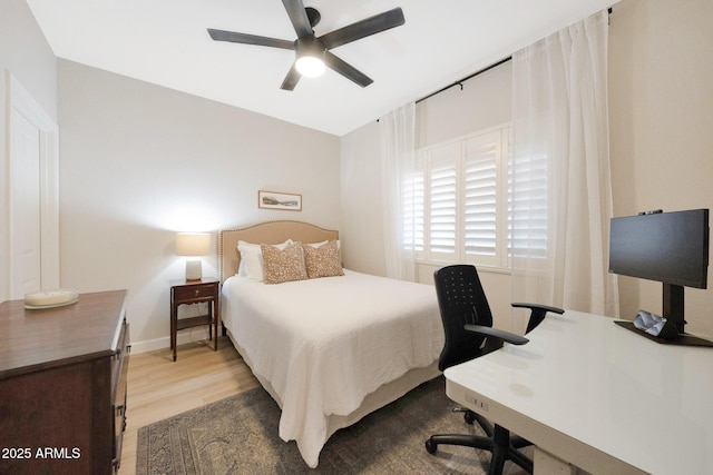 920 E Devonshire Ave Unit 4004, Phoenix, AZ 85014 - bedroom with wood finished floors, a desk, and a ceiling fan