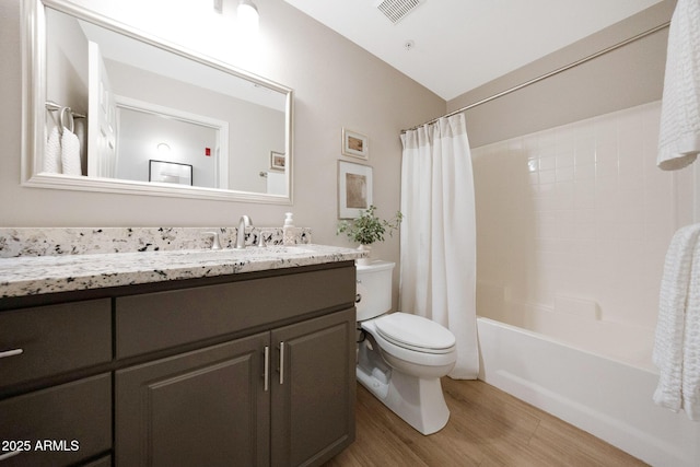 920 E Devonshire Ave Unit 4004, Phoenix, AZ 85014 - bathroom featuring vanity, wood finished floors, and shower / bath combo with shower curtain