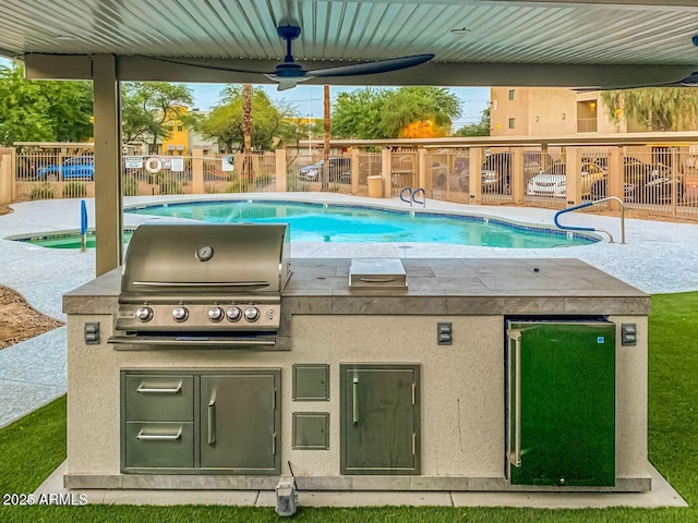 920 E Devonshire Ave Unit 4004, Phoenix, AZ 85014 - community pool with exterior kitchen and ceiling fan