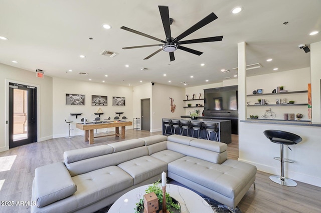 920 E Devonshire Ave Unit 4004, Phoenix, AZ 85014 - living room featuring light wood finished floors, ceiling fan, and recessed lighting