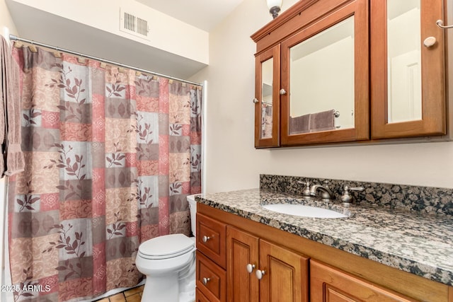 full bath with visible vents, a shower with curtain, toilet, vanity, and tile patterned flooring