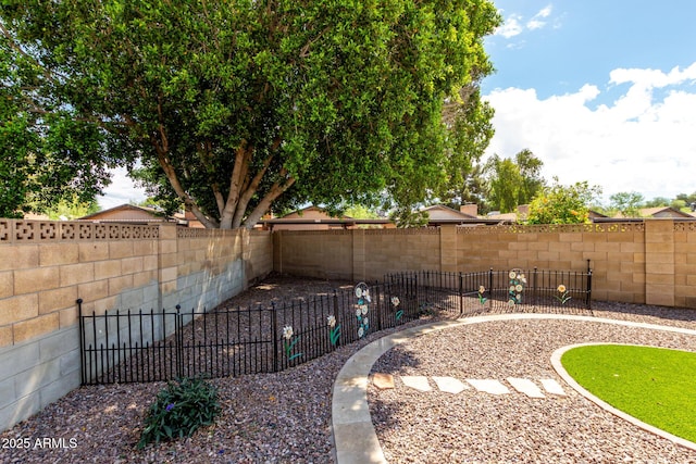 view of yard featuring a fenced backyard
