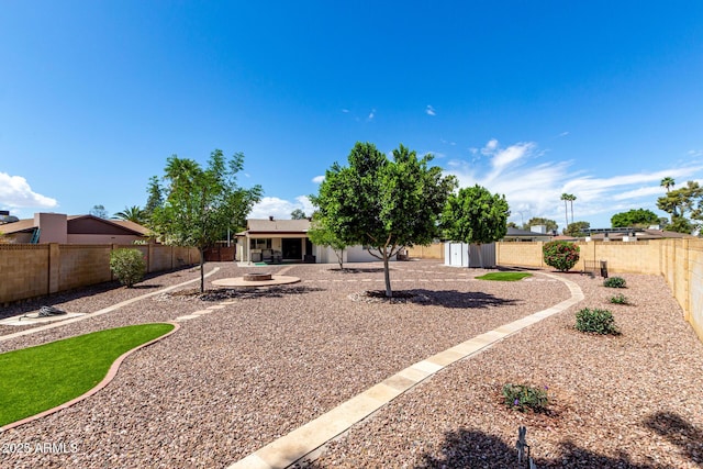 view of yard featuring a fenced backyard and a patio