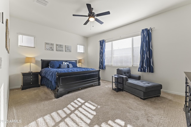 bedroom featuring baseboards, visible vents, and carpet floors