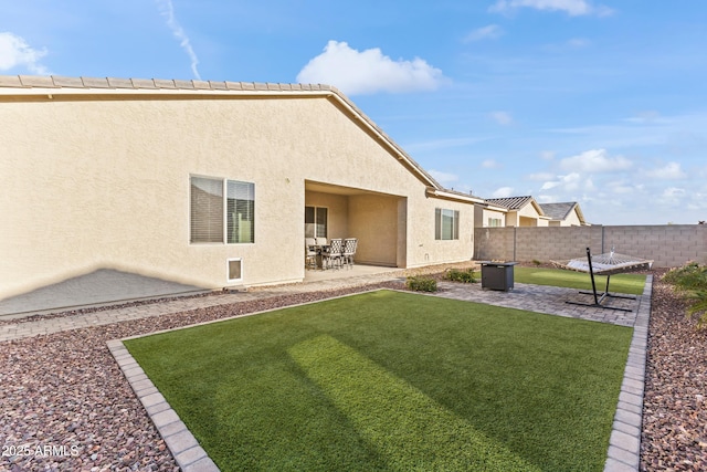 view of yard featuring a patio area and fence