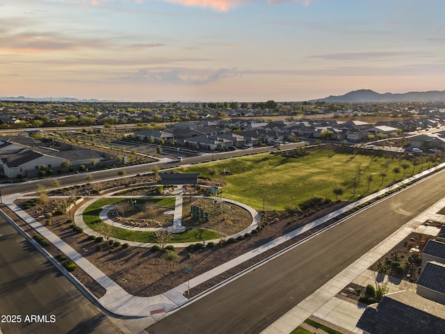 birds eye view of property featuring a mountain view and a residential view