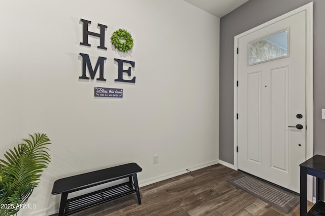 entryway with baseboards and dark wood-style flooring