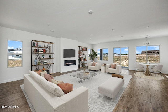 living room featuring an inviting chandelier