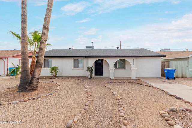 single story home featuring a garage