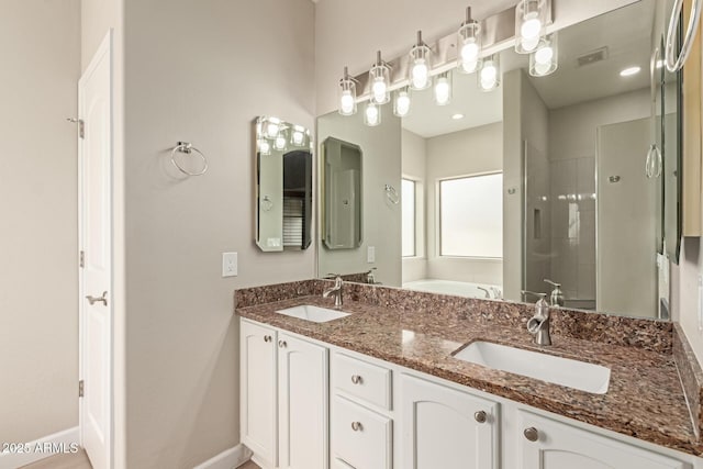 bathroom featuring a garden tub, baseboards, a tile shower, and a sink