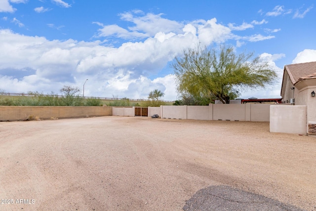 view of yard with fence