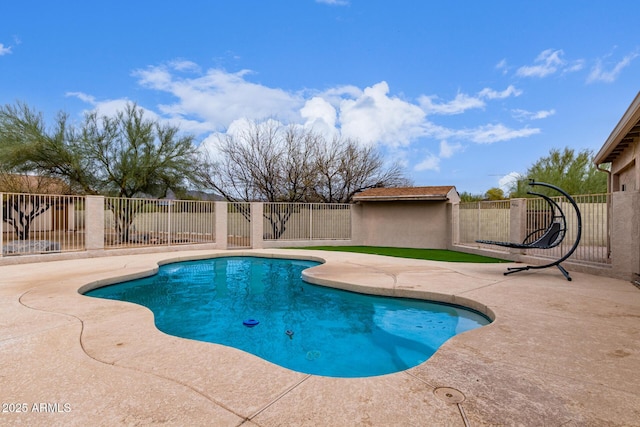 view of pool featuring a patio area, fence, and a fenced in pool