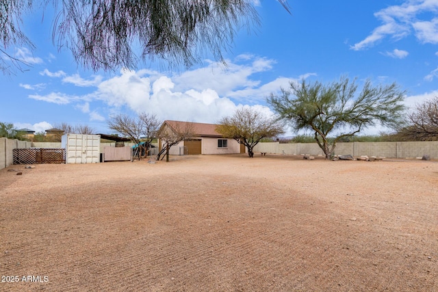 view of yard featuring a fenced backyard