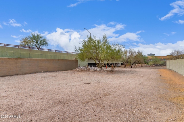 view of yard featuring fence