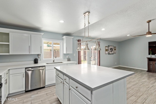 8051 W Mariposa Dr, Phoenix, AZ 85033 - kitchen featuring dishwasher, a sink, open shelves, light wood-type flooring, and light countertops