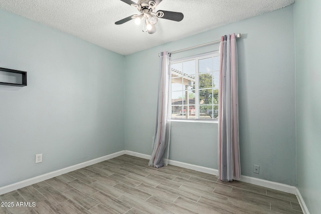 8051 W Mariposa Dr, Phoenix, AZ 85033 - unfurnished room with a textured ceiling, ceiling fan, light wood finished floors, and baseboards