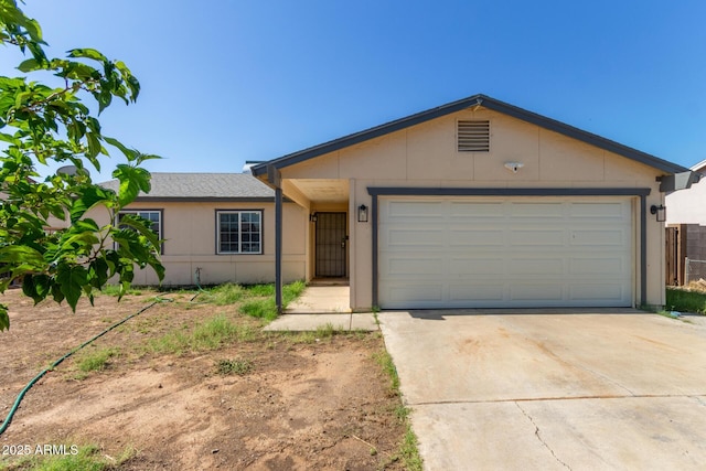 8051 W Mariposa Dr, Phoenix, AZ 85033 - ranch-style house with driveway and a garage