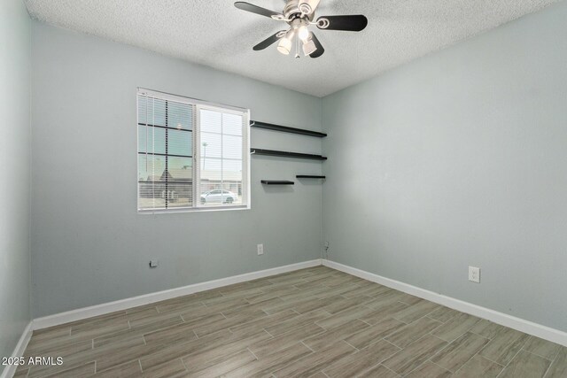 8051 W Mariposa Dr, Phoenix, AZ 85033 - unfurnished room featuring a textured ceiling, light wood-type flooring, a ceiling fan, and baseboards