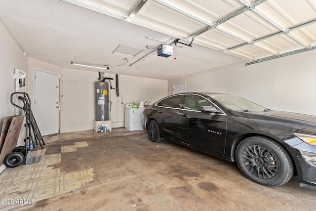 8051 W Mariposa Dr, Phoenix, AZ 85033 - garage with independent washer and dryer, water heater, and a garage door opener