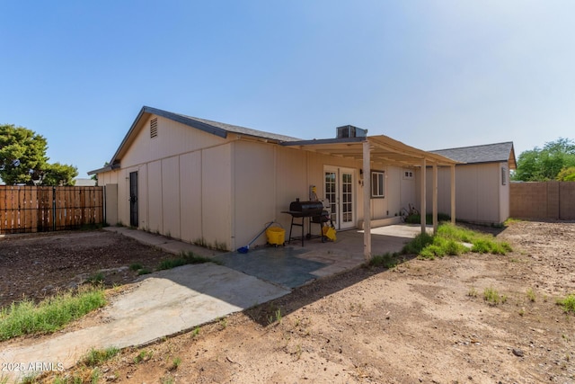 8051 W Mariposa Dr, Phoenix, AZ 85033 - rear view of house featuring a fenced backyard and a patio