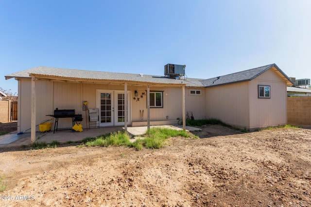 8051 W Mariposa Dr, Phoenix, AZ 85033 - back of property featuring french doors, a patio area, and central AC unit