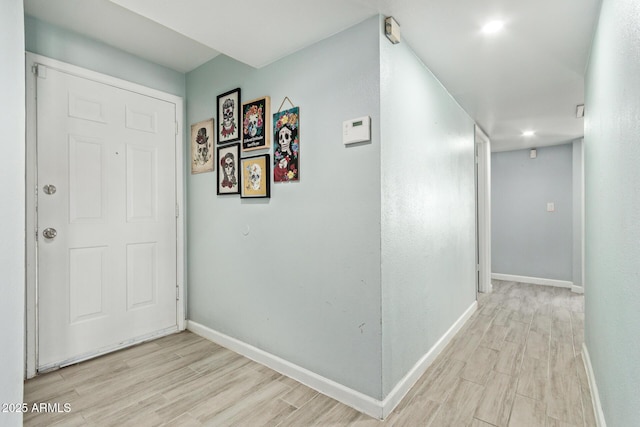 8051 W Mariposa Dr, Phoenix, AZ 85033 - hall featuring wood finished floors and baseboards