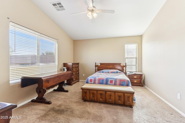 carpeted bedroom featuring lofted ceiling and ceiling fan